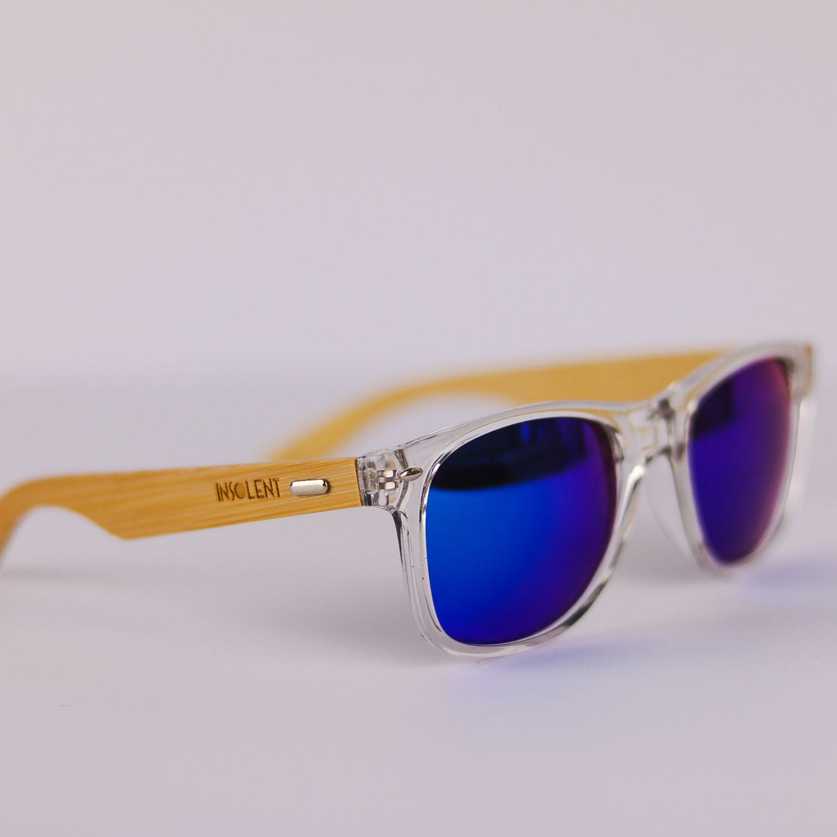 Logo Insolent patillas bambú gafas de sol con montura transparente modelo TYRION ROSS